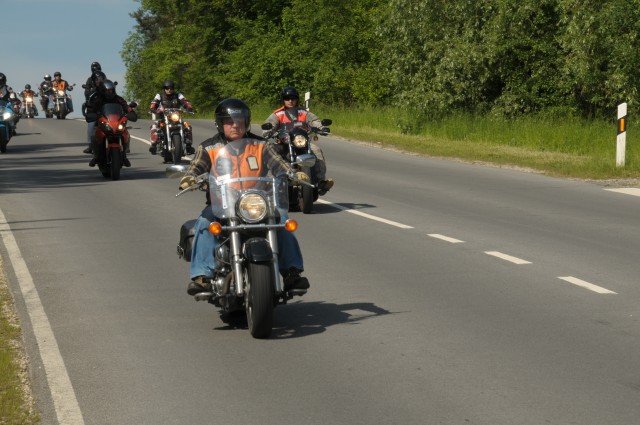Motorcyclists from USAG Hohenfels escort Steve Foster to the former Stalag 383