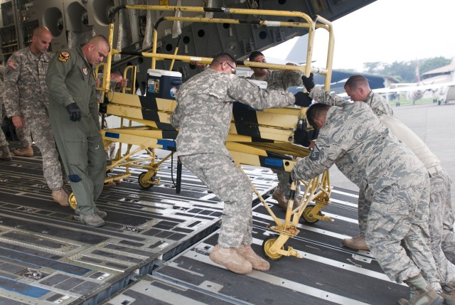 Hawaii Guard personnel unload C-17 Globemaster III