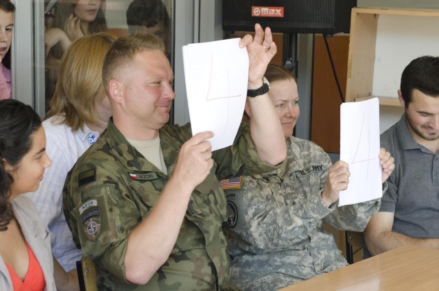 KFOR troops, school principal host talent show
