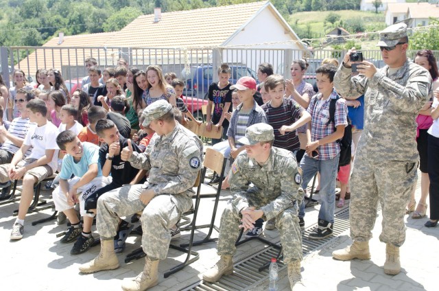 KFOR troops, school principal host talent show