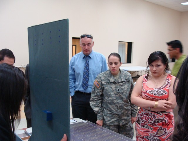 5th AR officer helps judge Parkland High School T-STEM projects 