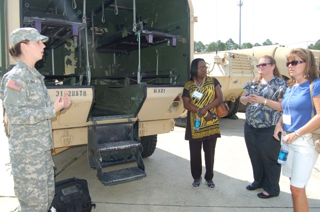 Jacksonville Battalion tour participants learn about the job of a Combat Medic