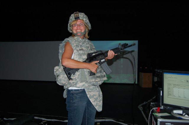 Jacksonville Battalion tour participant Cheryl Arp takes it all in at Fort Stewart's Virtual Training Facility