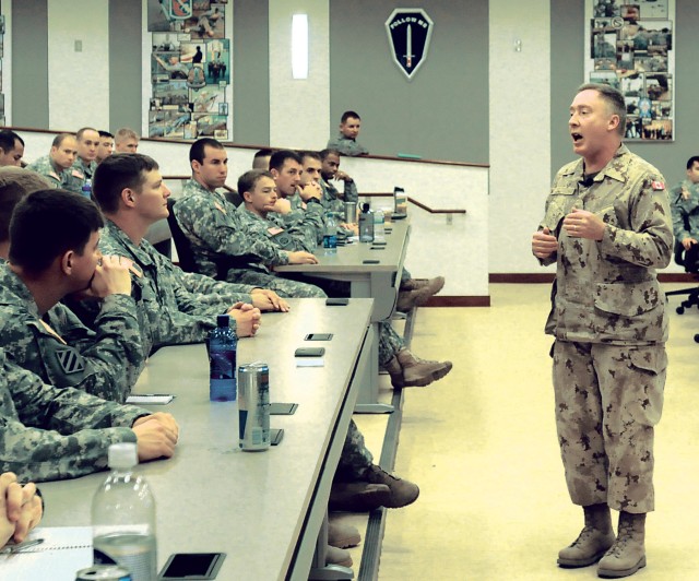 Commander of Canadian Army, speaks to a group of students from the Maneuver Captains Career Course