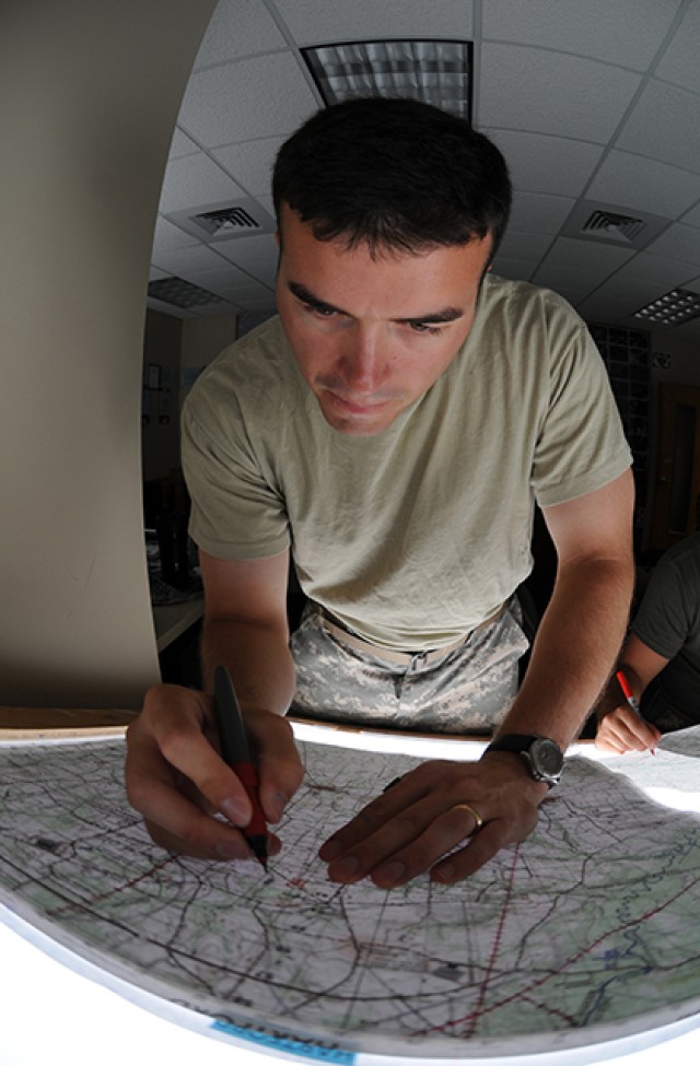 Students drill down during flight school to construct maps