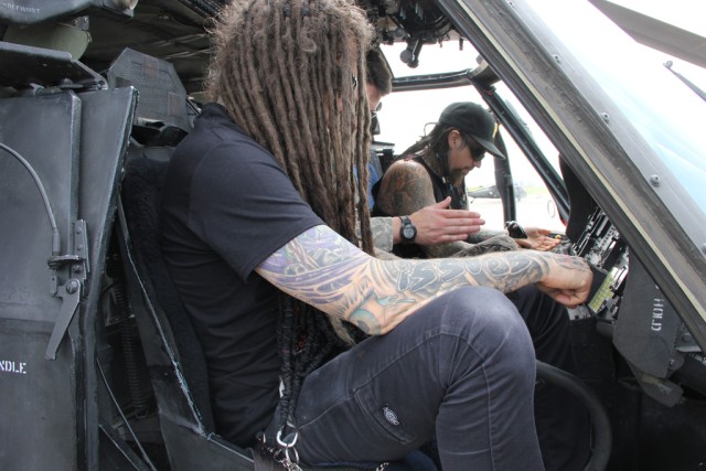 Korn gets the VIP tour of a UH-60 Blackhawk helicopter.