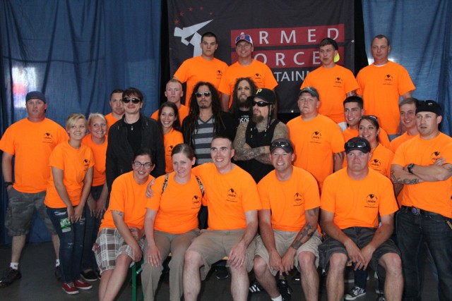 Korn poses with volunteers from the USAG Ansbach BOSS program.