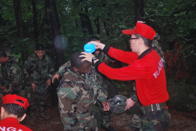 U.S. Soldier gets deconaminated by South Korean Drill Instructor