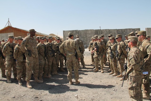 'Mustang' soldiers awarded combat badges