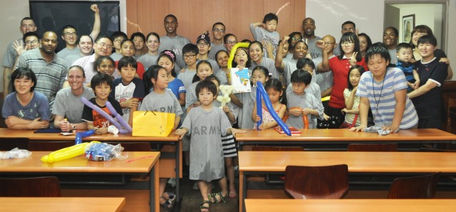 U.S. Soldiers teach Korean kids Army PT