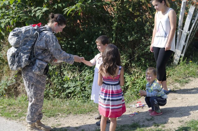 KFOR soldiers face summer heat during DANCON march