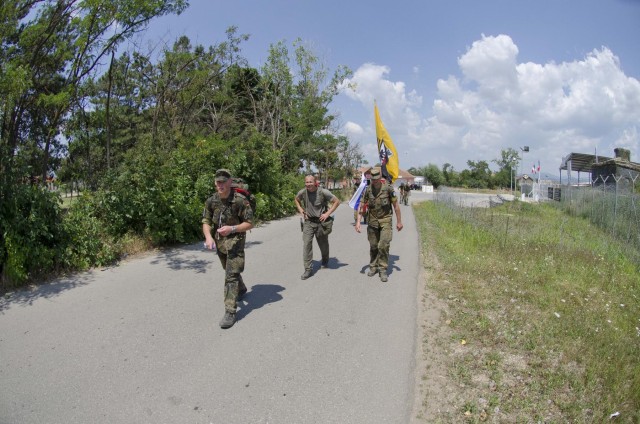 KFOR soldiers face summer heat during DANCON march