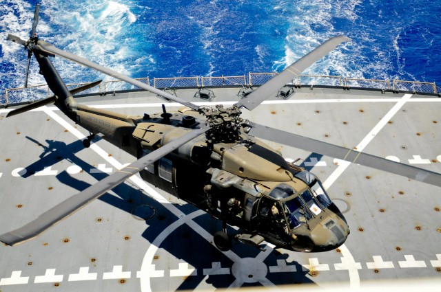 25th CAB; Navy perform deck landings