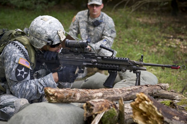 Hohenfels Soldier is tested on a patrol lane while earning the Expert Infantryman Badge