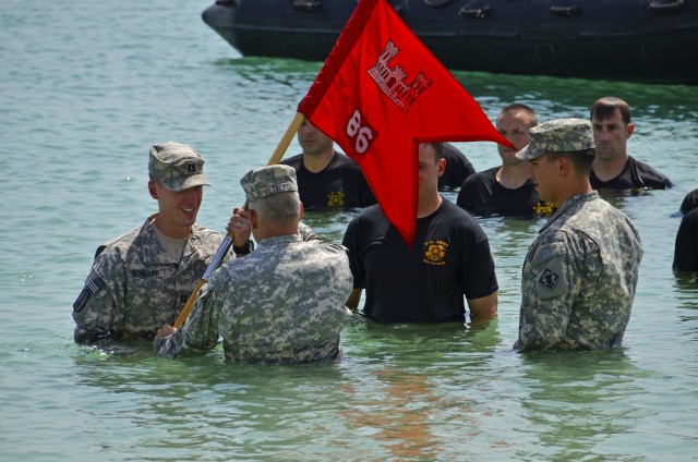 The 86th Engineer Dive Detachment changes command in their own way