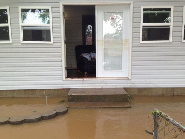 Area flash floods hammer homes, community