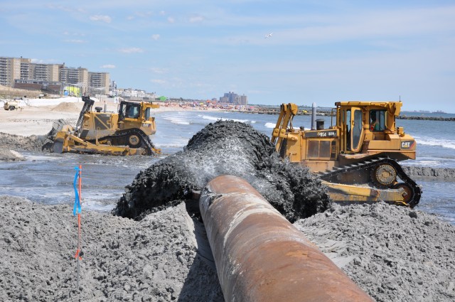 Replenishing sand at Rockaway Beach, New York