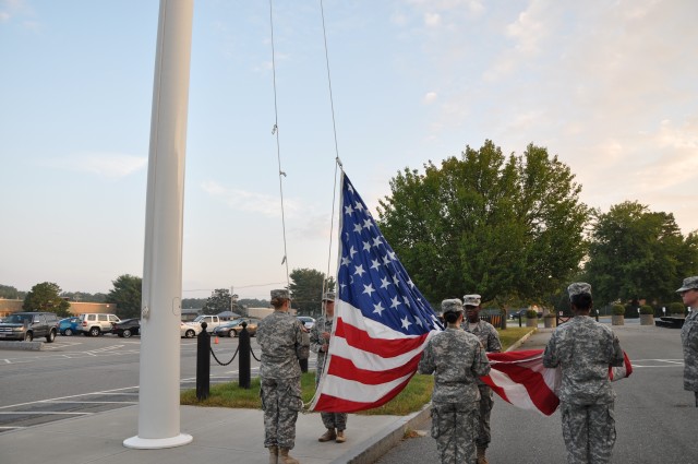 Female flag detail honors Women's Equality Day