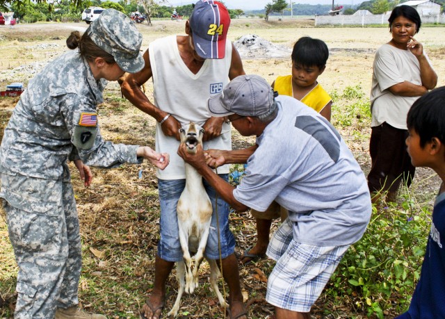 Capt. Jennifer Scruggs works with locals in Philippines.