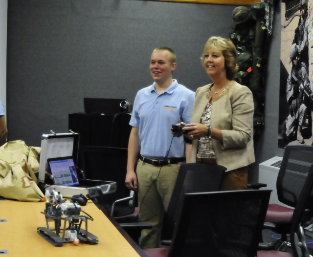 Bulger controlling student-built robot 