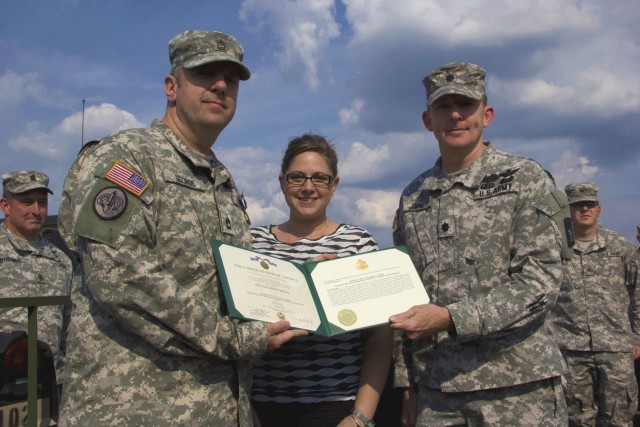 Sgt. 1st Class Geroge displays his Slodiers Medal.