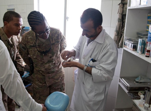 US, Afghan dentists sketch out partnership at police clinic