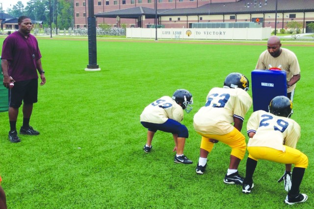 Coach monitors drills