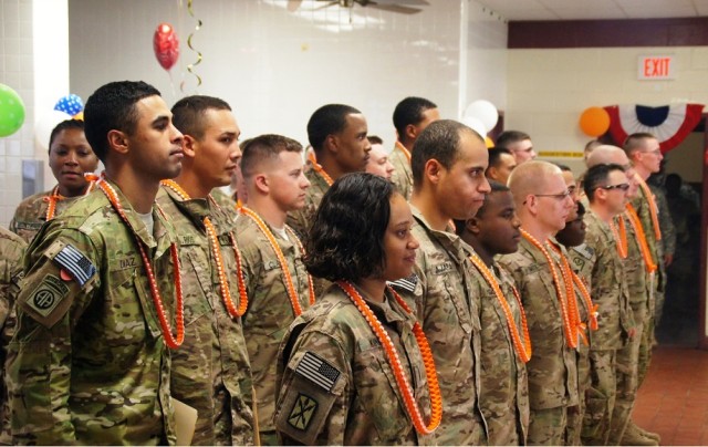 The first group of redeployed Co. A Soldiers make their way into the 307th Expeditionary Signal Battalion Dining Facility