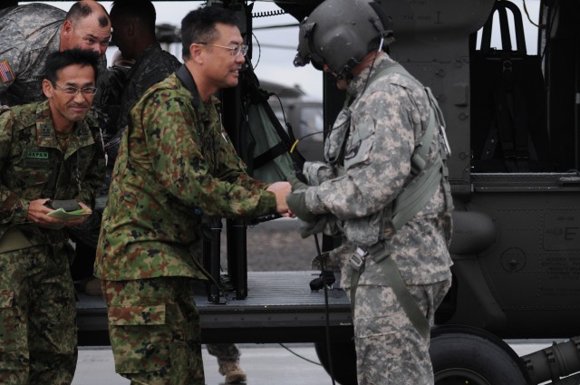 A Japanese Maj. Gen. gets an aerial tour of the Yakima Training Center, Wash.