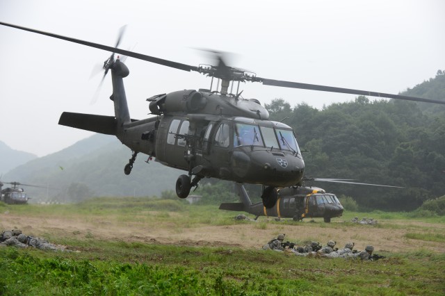ASSAULT UNIT PROVIDE AIR SUPPORT TO INFANTRY SOLDIERS