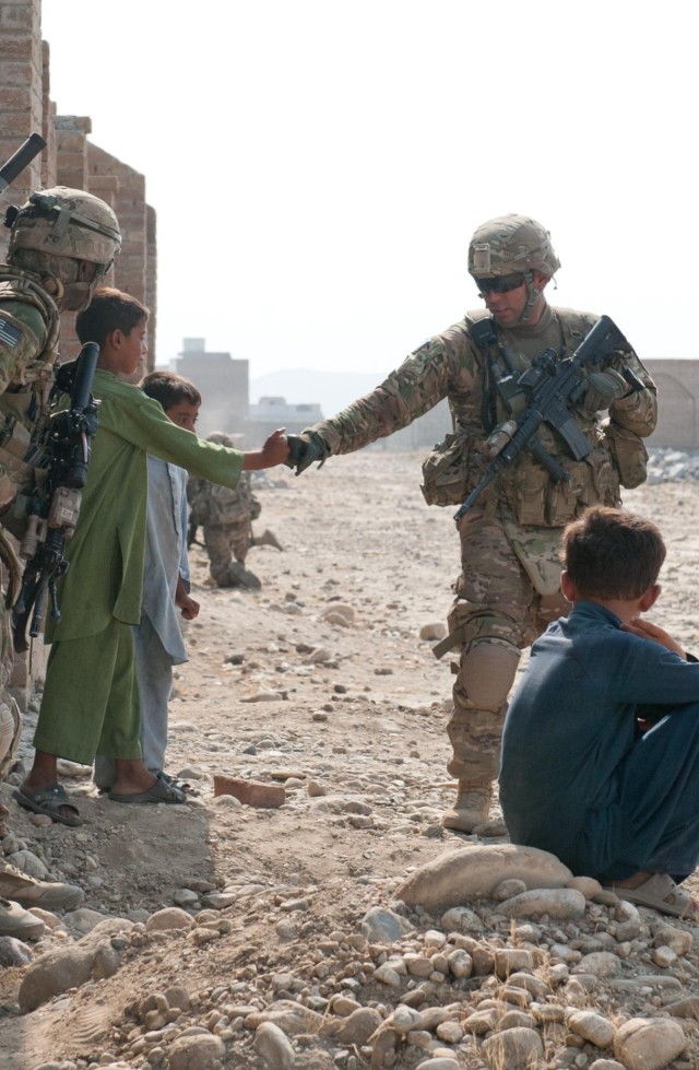 Troop C rubs elbows with locals to thwart enemies