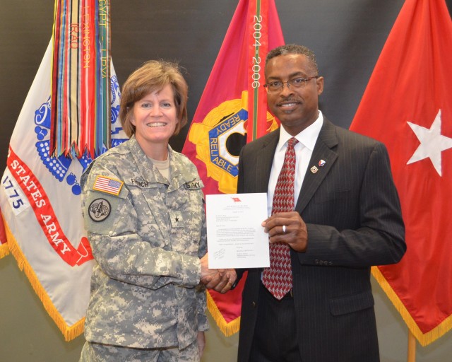 Rickey Peer receives one star note from Brig. Gen. Kristin K. French