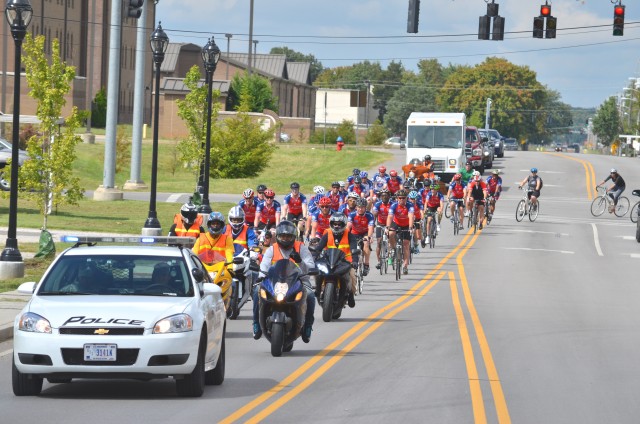 Cyclists welcomed with military escort