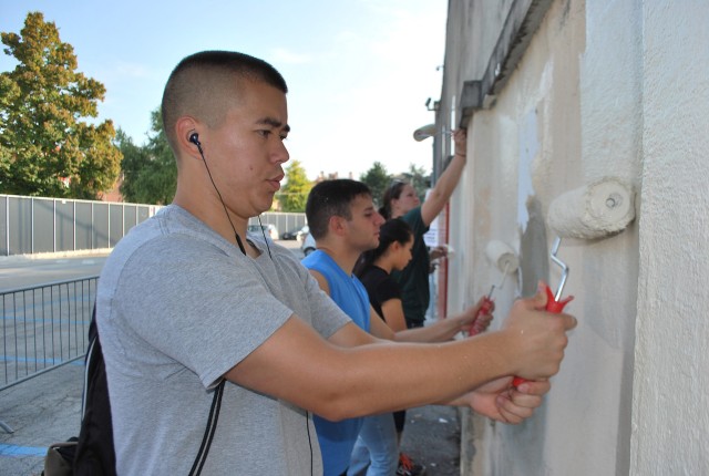 Sky Soldiers volunteer to paint Vicenza soccer stadium