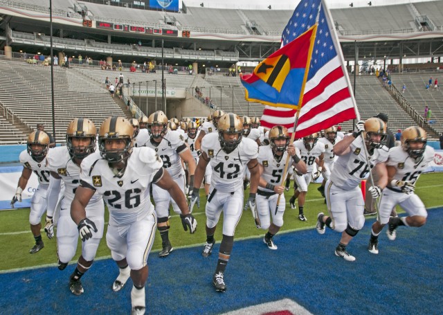 West Point Black Knights charge the field at Cotton Bowl Stadium