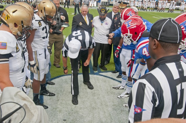 Medal of Honor recipient tosses coin in West Point/La. Tech game