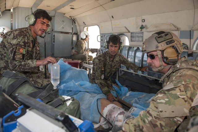 Afghan air force flight medics provide medical care, boost confidence