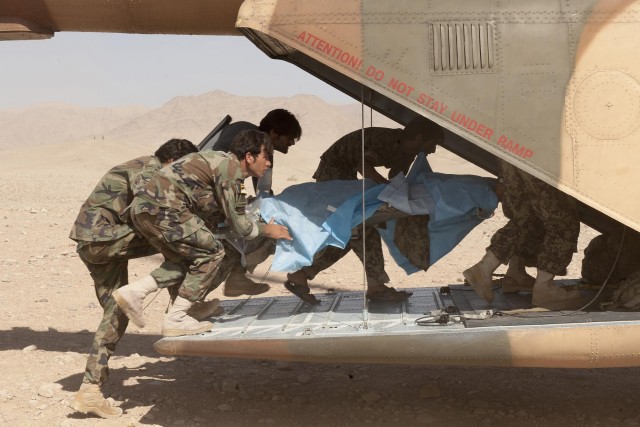 Afghan air force flight medics provide medical care, boost confidence