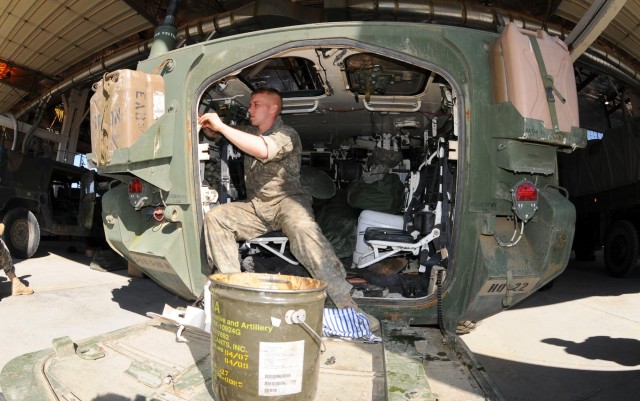 Combined operations shop keeps vehicles on move