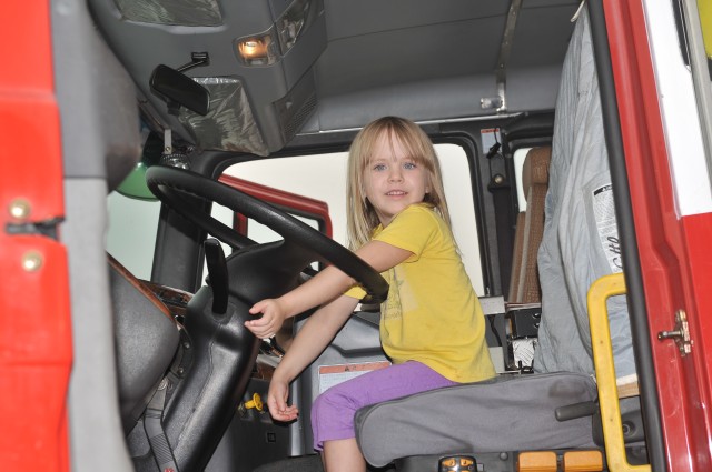 Chldren explore fire safety vehicles