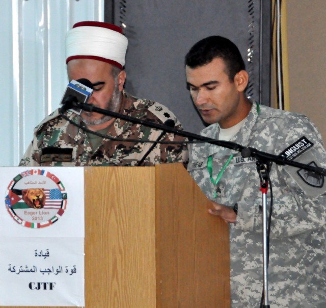 A 51st Translator/Interpreter Company Soldier translates for a Jordanian senior military official