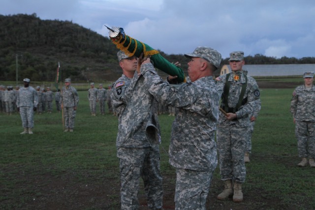 LTC Richard Ball and CSGM Timothy Lamb uncase 93rd MP BN Colors during Assumption of Authority Ceremony
