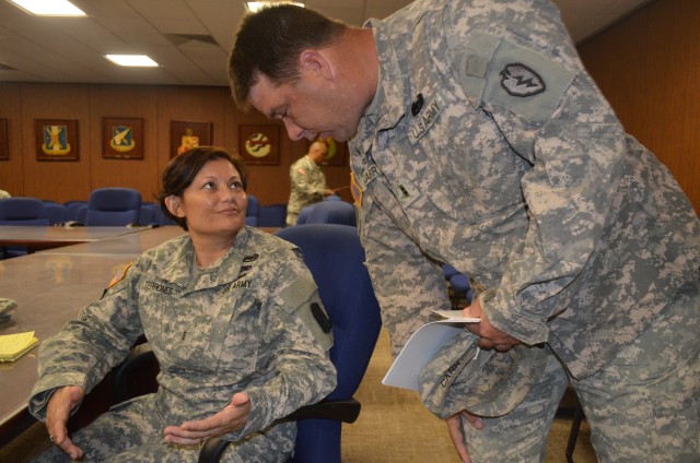 Cancer survivor credits strength to family, Soldiers