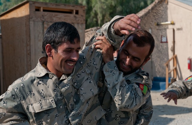 Training trainers: Afghan police lifesavers practice medical skills to teach to comrades