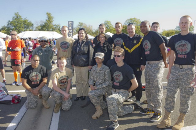 Army Sgt. Maj. Raymond F. Chandler III recognizes JROTC cadets for their volunteer service