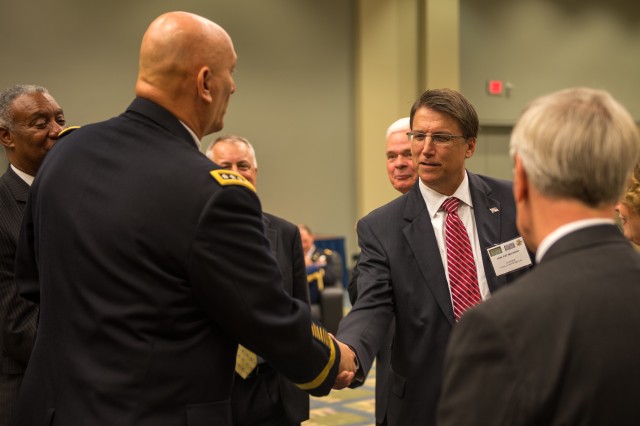 Army Chief of Staff Gen. Raymond T. Odierno shakes hands with the Governor of North Carolina Hon. Pat McCrory