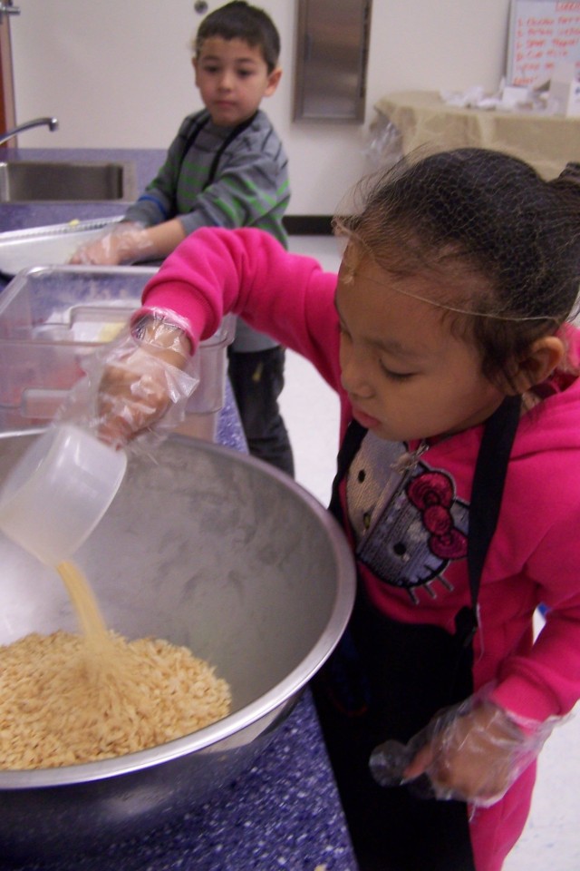 Mixing the Rice Krispie treats