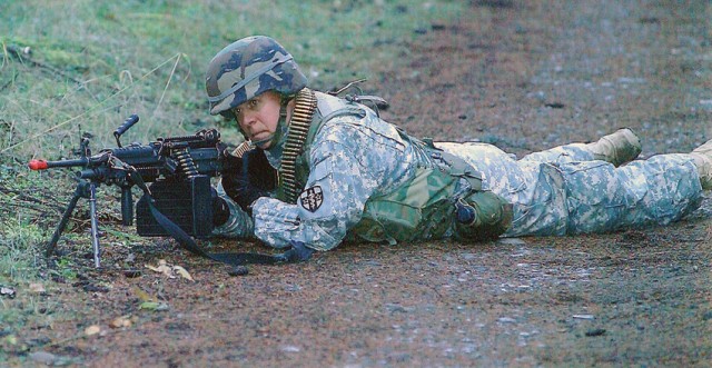 Spc. Roy DeWeese takes direct fire during the Warrior Leader Course