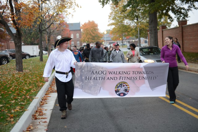 Goblins and ghouls use fitness tools at AAOG Halloween Bash