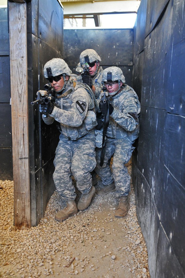 Cav Troops engage targets, clear rooms